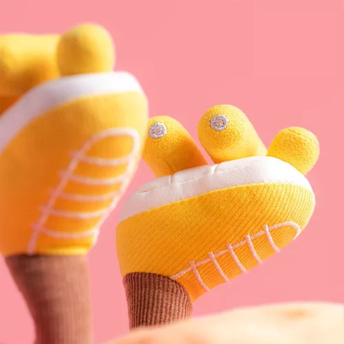 Jellycat plüss nap sportos fejpánttal és görkorcsolyával