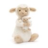 Huddles ölelkező bárány mama és baba